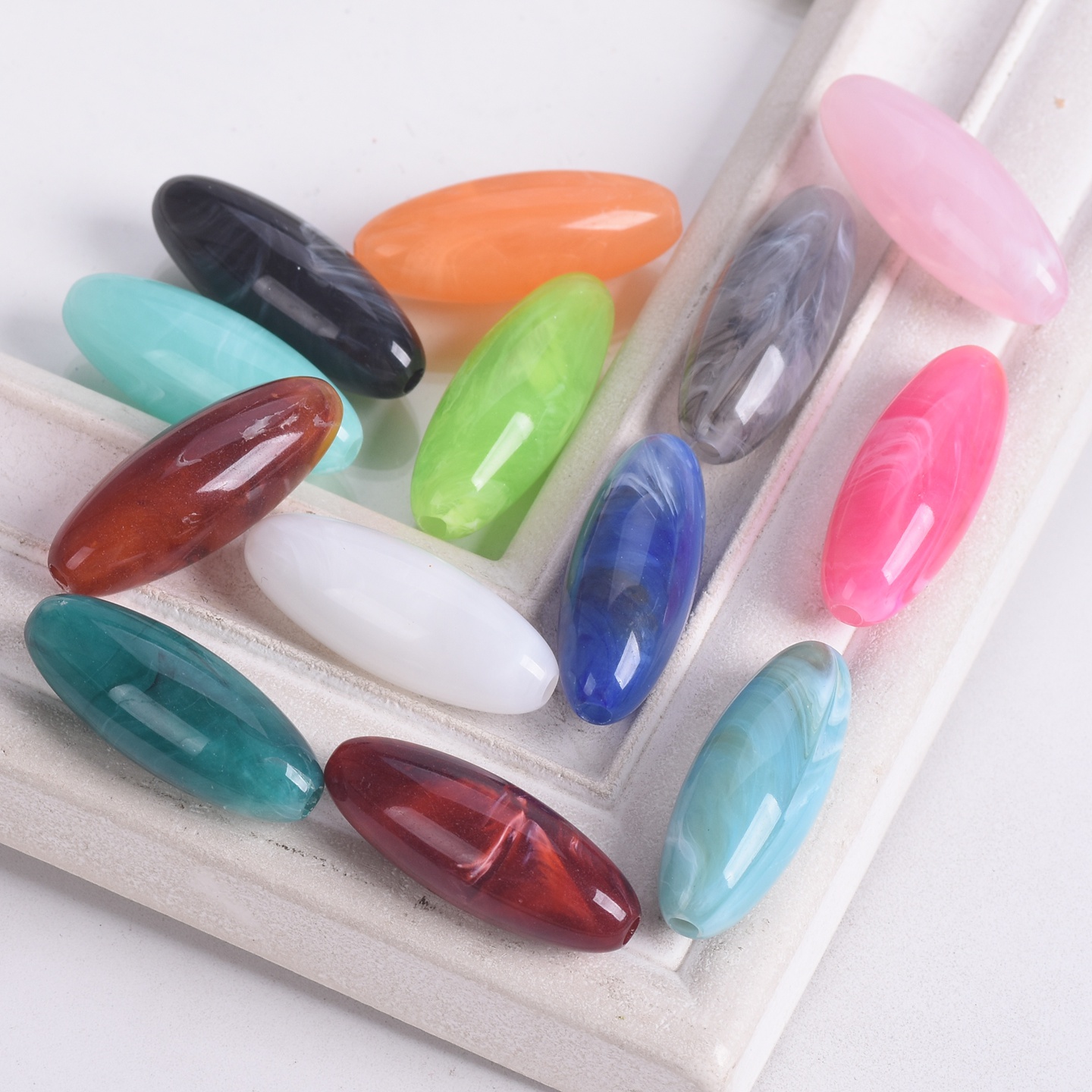 10 個ラグビーオーバル形状 31 × 12 ミリメートル大 - Vintage Collectible Marbles のレビューと価格