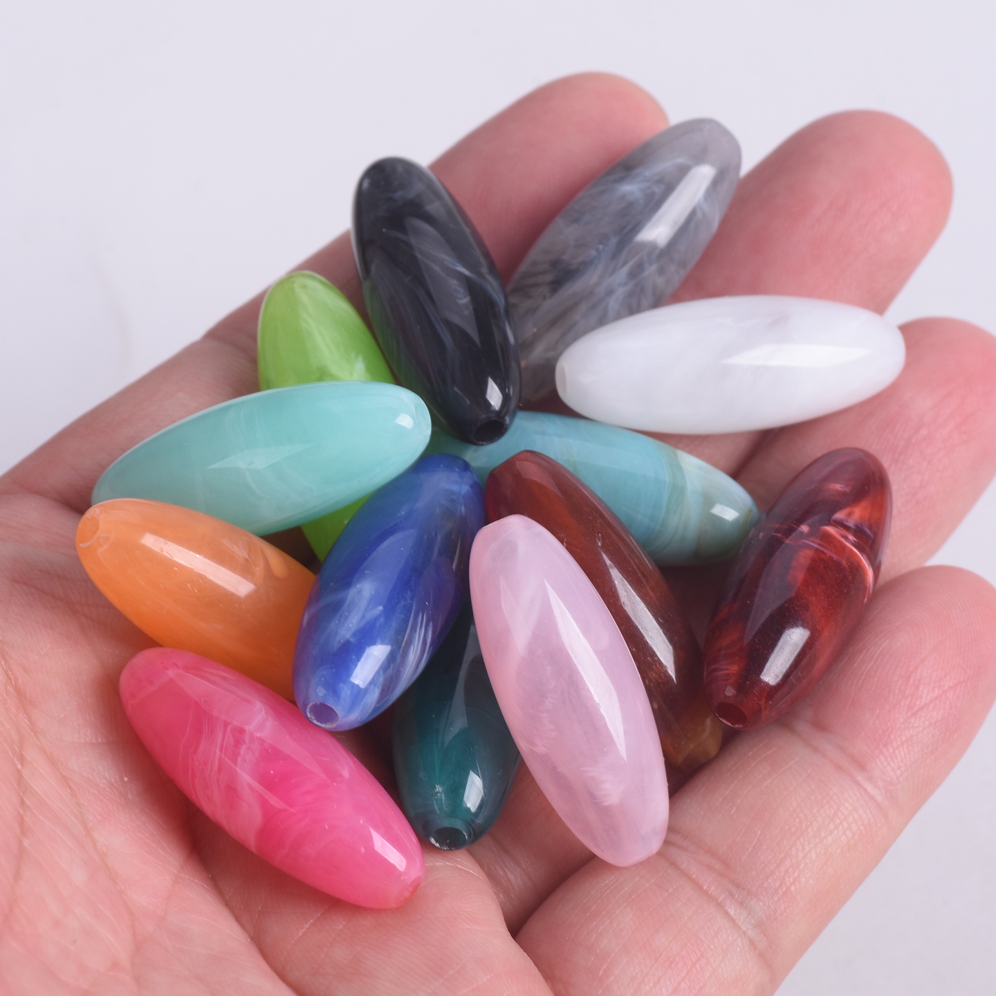 10 個ラグビーオーバル形状 31 × 12 ミリメートル大 - Vintage Collectible Marbles のレビューと価格